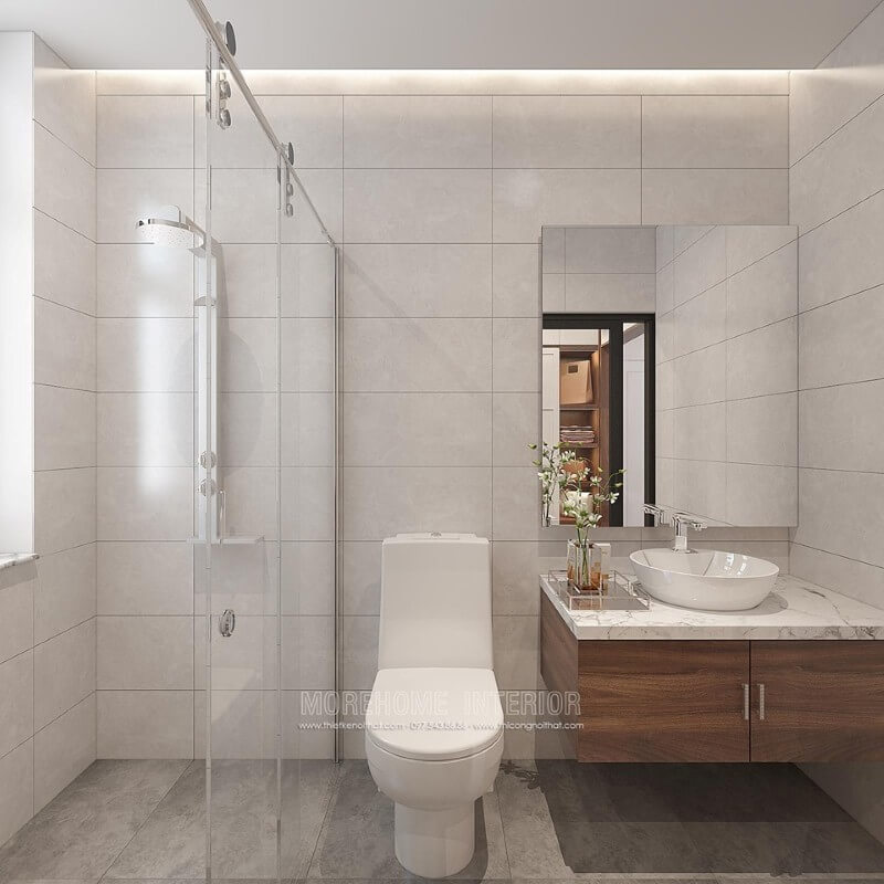Thiết kế phòng tắm đẹp và hiện đại với ý tưởng sử dụng gam màu đơn sắc màu xám chủ đạo kết hợp chất liệu gỗ óc chó. Mẫu thiết kế sẽ là lựa chọn rất phù hợp trong các không gian vừa và nhỏ như chung cư, nhà phố, nhà liền kề,.. thiết kế nội thất chung cư