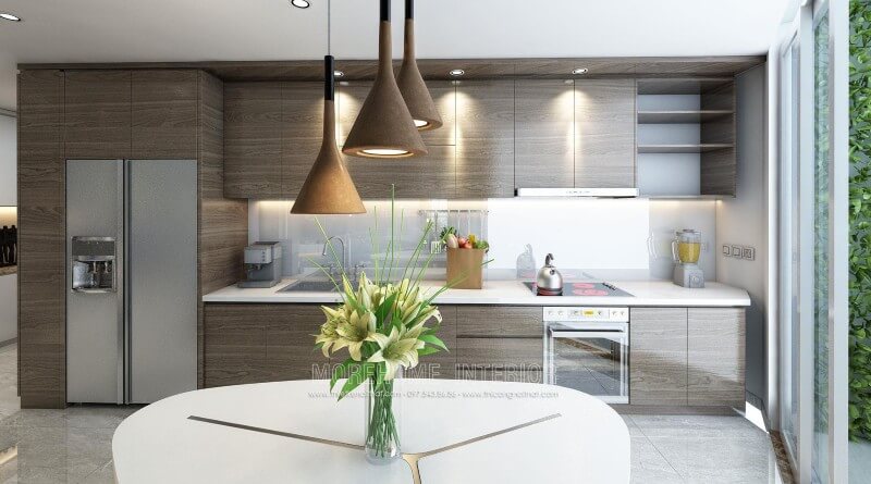 Thiết kế tủ bếp gỗ Laminate cho chung cư hiện đại. Để tạo nên không gian bếp ấn tượng, sạch sẽ và rộng rãi, gia chủ đã lựa chọn sử dụng đá ốp bên màu trắng solid surface cao cấp góp phần tạo nên một không gian bếp đẹp mắt Trang trí nội thất chung cư