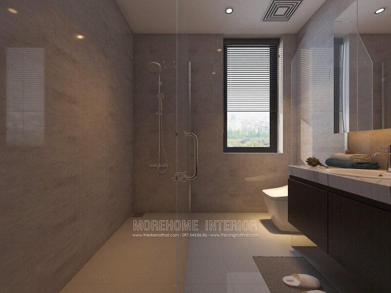 Vách tắm kính 135 độ với trang trí khoa học giúp không gian phòng tắm nhỏ trở nên thông thoáng nhưng vẫn đảm bảo tiện nghi. thiết kế nội thất chung cư