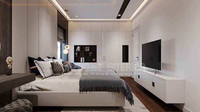 Kệ tivi sơn trắng gỗ công nghiệp ấn tượng với tay nắm âm độc đáo tạo vẻ đẹp sang trọng cho phòng ngủ hiện đại. thiết kế chung cư