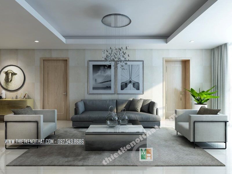 Phòng khách chung cư tiện nghi với bộ sofa vải màu xám và trắng mang đến vẻ đẹp đơn giản, tinh tế cho căn phòng. Mẫu thiết kế nội thất phòng khách chung cư hiện đại
